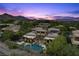 Breathtaking aerial view of the property highlighting its custom architecture, pool, and serene desert landscape at 11 Golden Sunray Ln, Las Vegas, NV 89135