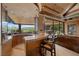 A full bar adjoins the living room with granite counters, stainless steel sink and comfortable seating at 11 Golden Sunray Ln, Las Vegas, NV 89135