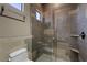 Modern bathroom with glass enclosed shower and modern fixtures at 11 Golden Sunray Ln, Las Vegas, NV 89135
