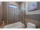 Modern bathroom showcasing a stylish shower-tub, toilet and a decorative wall painting at 11 Golden Sunray Ln, Las Vegas, NV 89135