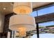 Close up view of a unique, modern chandelier at 11 Golden Sunray Ln, Las Vegas, NV 89135