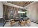 Modern dining room boasts stylish table, chairs, and unique bamboo-themed wall decor at 11 Golden Sunray Ln, Las Vegas, NV 89135