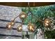 Modern lighting fixture with exposed glass bulbs and black metal hardware at 11 Golden Sunray Ln, Las Vegas, NV 89135