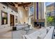 Spacious living room boasting high ceilings, fireplace, and an open design, filled with natural light and elegant decor at 11 Golden Sunray Ln, Las Vegas, NV 89135
