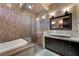 Modern main bathroom with walk-in shower, vessel sink, and updated fixtures at 11 Golden Sunray Ln, Las Vegas, NV 89135