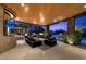 Expansive outdoor living space with comfortable seating, fire features, and stunning sunset views at 11 Golden Sunray Ln, Las Vegas, NV 89135