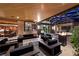 Elegant outdoor patio featuring comfortable seating, modern fire features, and seamless indoor-outdoor living at 11 Golden Sunray Ln, Las Vegas, NV 89135