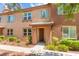 Charming townhome with a well-maintained front yard and inviting entrance at 11402 Newton Commons Dr # 102, Las Vegas, NV 89135