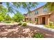 Beautiful townhome community with manicured landscaping and well-maintained exteriors at 11402 Newton Commons Dr # 102, Las Vegas, NV 89135