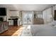 Large main bedroom with a sitting area, fireplace, and mini bar at 11830 Kingsbarns Ct, Las Vegas, NV 89141