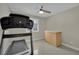 This bonus room boasts tile floors, modern fan, and ample space for exercise or storage at 1335 Passiflora Dr, Henderson, NV 89002