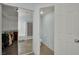 The main bathroom shows a walk-in closet, access to the toilet, and the tiled shower/tub at 1335 Passiflora Dr, Henderson, NV 89002