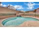 Inviting backyard pool with a waterfall feature and ample space for relaxation at 1335 Passiflora Dr, Henderson, NV 89002