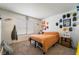 Cozy bedroom featuring carpet, a bed, and wall decorations at 1575 W Warm Springs Rd # 2822, Henderson, NV 89014
