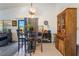 Cozy dining area with unique decor, adjacent to a sunlit balcony at 1575 W Warm Springs Rd # 2822, Henderson, NV 89014