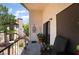 Private patio with seating, plants, and a view of the landscaped complex and walkways at 1575 W Warm Springs Rd # 2822, Henderson, NV 89014