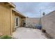 Backyard patio area with white bicycle against block wall at 1607 Vegas Valley Dr, Las Vegas, NV 89169