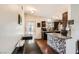 Eat-in kitchen with tile backsplash and dark brown cabinets at 1607 Vegas Valley Dr, Las Vegas, NV 89169