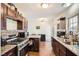Kitchen boasts granite countertops, stainless steel appliances, and ample cabinet space at 1607 Vegas Valley Dr, Las Vegas, NV 89169