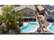 Backyard featuring a stunning pool area and covered patio perfect for entertaining guests at 1906 Desert Sage Ave, North Las Vegas, NV 89031