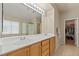 Bathroom with double sinks, vanity, and large mirror at 1906 Desert Sage Ave, North Las Vegas, NV 89031