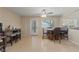 Bright dining room with tile floors and lots of natural light at 1906 Desert Sage Ave, North Las Vegas, NV 89031