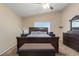 Bedroom with neutral walls, carpet flooring, and a large bed at 1906 Desert Sage Ave, North Las Vegas, NV 89031