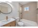 Bright bathroom featuring modern fixtures, stylish vanity, and a shower-tub combination at 2117 Desert Peak Rd, Las Vegas, NV 89134