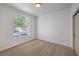 Comfortable bedroom with large window and neutral carpet at 2117 Desert Peak Rd, Las Vegas, NV 89134