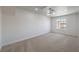 Neutral carpeted bonus room with a window to provide natural light at 2117 Desert Peak Rd, Las Vegas, NV 89134