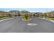 Gated community entrance features a manicured median and decorative signage for a secure neighborhood at 2433 Amatrice St, Henderson, NV 89044