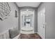 Foyer featuring unique tile work, archways and decorative lighting at 2433 Amatrice St, Henderson, NV 89044