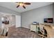 Dedicated home office features a view to the foyer and living space beyond at 2433 Amatrice St, Henderson, NV 89044