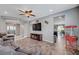 Living room with ceiling fan, furniture and decor elements at 2433 Amatrice St, Henderson, NV 89044