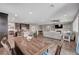 Spacious open floor plan boasts a kitchen, living room, dining area and tile floors throughout at 2433 Amatrice St, Henderson, NV 89044