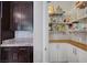 Walk-in pantry features ample shelving and storage space at 2433 Amatrice St, Henderson, NV 89044