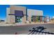 Modern commercial building with retail spaces and ample parking for easy access at 2433 Amatrice St, Henderson, NV 89044