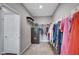 Walk-in closet offering secure storage with a large safe, plus plenty of space for clothes and accessories at 2433 Amatrice St, Henderson, NV 89044