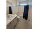 Well-lit bathroom with a shower-tub combo and modern vanity at 289 Aravalli Crest St, Henderson, NV 89015