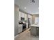 Kitchen boasts stainless steel appliances and tile flooring at 289 Aravalli Crest St, Henderson, NV 89015