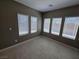 Well-lit room with tile flooring and multiple windows offering natural light at 289 Aravalli Crest St, Henderson, NV 89015
