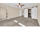 Bedroom featuring a ceiling fan, carpet, and closet with sliding doors at 3064 Bicentennial Pkwy, Henderson, NV 89044