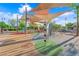 A vibrant playground with climbing structures offers hours of fun for children at 3064 Bicentennial Pkwy, Henderson, NV 89044