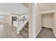 View of the staircase, kitchen, and breakfast bar area at 3064 Bicentennial Pkwy, Henderson, NV 89044
