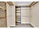 Walk-in closet with custom shelving and drawers at 3064 Bicentennial Pkwy, Henderson, NV 89044