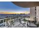 Spacious balcony with city views, table, and seating perfect for relaxing or entertaining at 3111 Bel Air Dr # 20H, Las Vegas, NV 89109