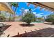 Beautiful backyard featuring a brick patio, trees for shade, and a refreshing swimming pool with spa at 3360 Paso Andres St, Las Vegas, NV 89146