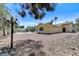 Backyard view showing patio area, landscaping and a partial view of the swimming pool at 3360 Paso Andres St, Las Vegas, NV 89146
