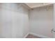 Empty closet with laminate floors and wooden shelf and rail at 3360 Paso Andres St, Las Vegas, NV 89146