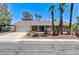 Charming single story home featuring a spacious driveway and xeriscaped front yard at 3360 Paso Andres St, Las Vegas, NV 89146